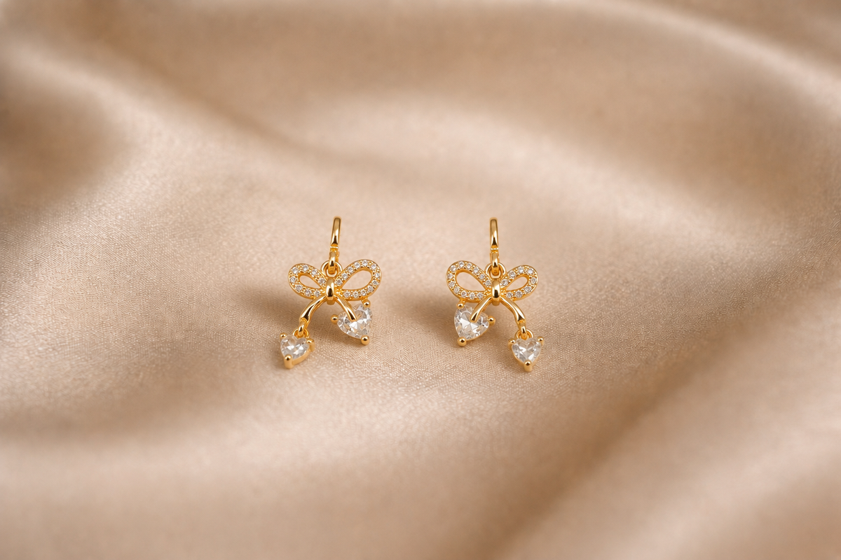 Mangamta Dainty Bowknot with Dangling Heart Drops Earrings