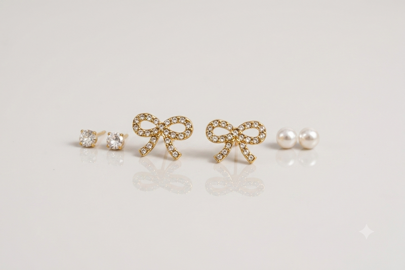 Mangamta 3 Pair Earrings Combo Set for Women – Bow, Crystal Stud & Pearl Stud Designer Fashion Earrings.