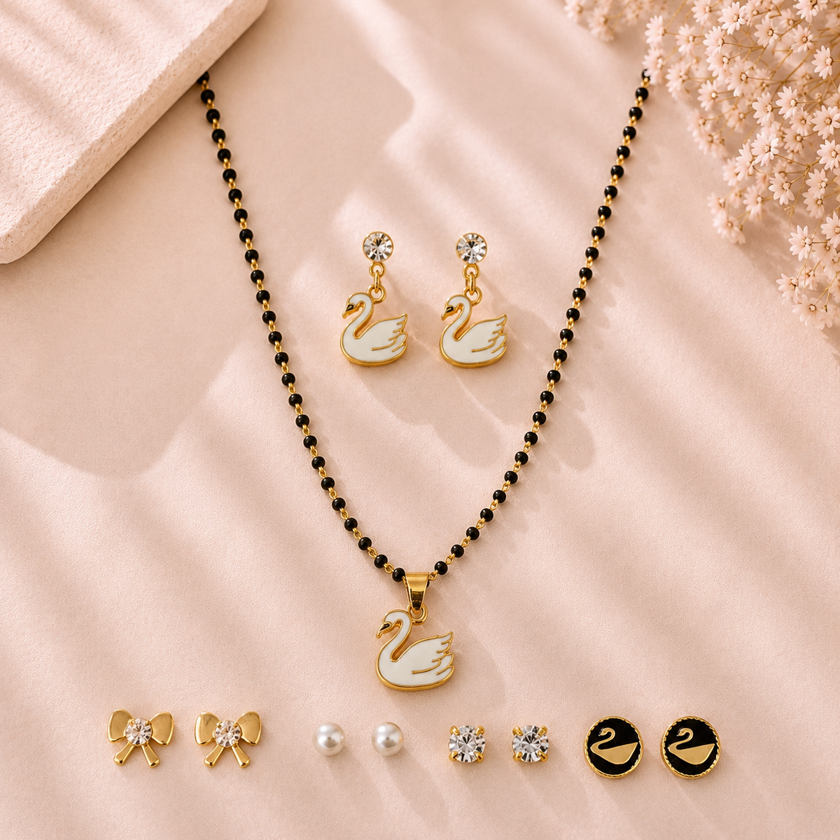 Mangamta Graceful White Swan Mangalsutra Set with 5 Pairs of Fashion Earrings