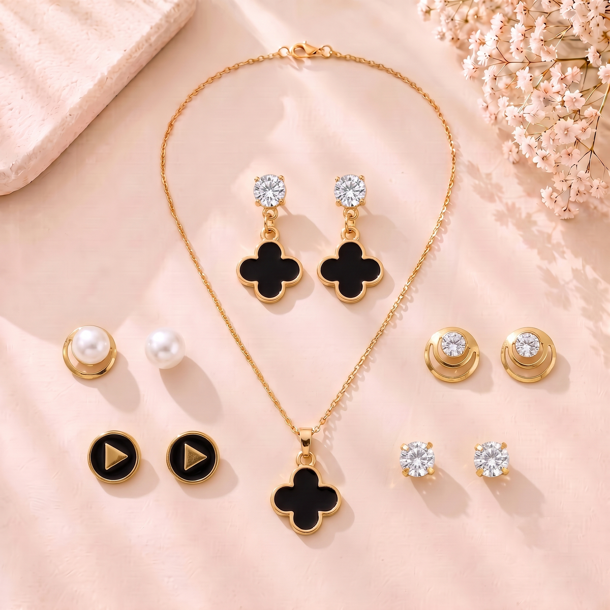 Mangamta Black Clover Motif Pendant Necklace Set with 5 Pairs of Coordinated Studs